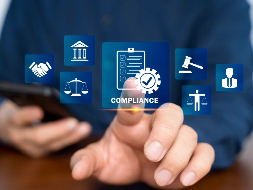 business man with compliance icons